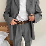 Pale grey pinstriped suit