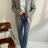 Contrasted blazer in grey checkered tones