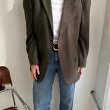 Contrasted blazer in green tones