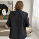 Black with white stripes button back blazer