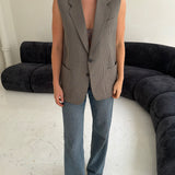 Stunning button back vest in plaid