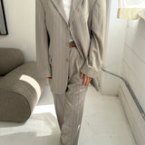 Light grey pinstriped suit