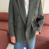 Green double-breasted button back blazer
