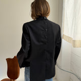 Button back blazer in Black pinstriped