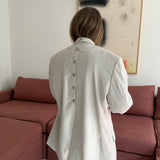 Button back blazer in cream pinstriped