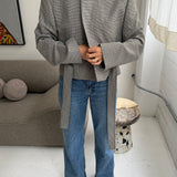 Belted blazer in Brown and blue houndstooth