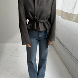 Belted blazer in dark hexagon pattern