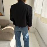 Cropped boxy blazer in black pinstriped