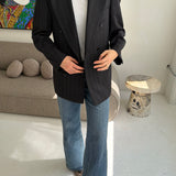 Dark grey pinstriped double-breasted blazer