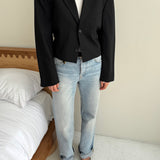 Cropped blazer with cinched waist in black