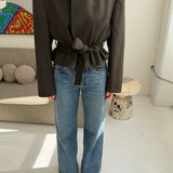 Belted blazer in dark olive green checkered