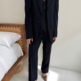 Navy pinstriped three piece suit