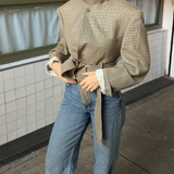 Belted blazer in warm tones