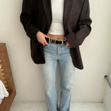 Contrasted blazer in green and brown tones