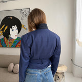 Blue checkered belted blazer