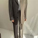 Contrasted suit in pale warm tones