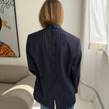 Double-breasted navy pinstriped button back blazer