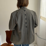 Pale green double-breasted button back blazer