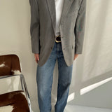 Contrasted blazer in checkered tones