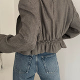 Black/white houndstooth cinched cropped blazer