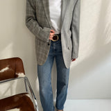 Contrasted blazer in grey checkered tones