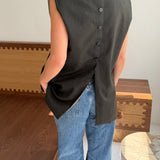 Double-breasted button back vest in green houndstooth