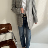 Contrasted blazer in grey checkered tones