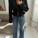 Belted blazer in black checkered