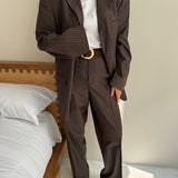 Brown suit with subtle stripes