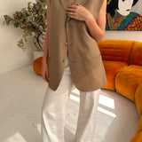 Stunning button back vest in Taupe/beige