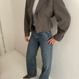 Cropped blazer with cinched waist in houndstooth