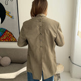 Double-breasted speckered beige button back blazer