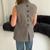 Stunning button back vest in plaid