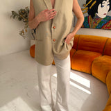 Stunning button back vest in beige