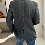 Solid green double-breasted button back blazer