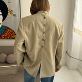 Button back blazer in Off white