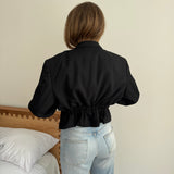 Cropped blazer with cinched waist in black