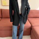 Double-breasted blazer in green wool