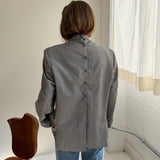Light grey pinstriped button back blazer