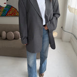 Grey pinstriped Dior blazer
