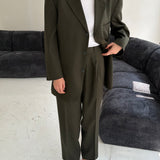 Stunning deep green suit