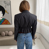 Cinched waist cropped blazer in dark grey pinstriped