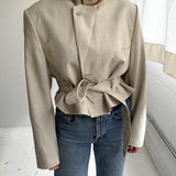 Light beige checkered belted blazer