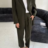 Stunning deep green suit