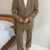 Pale green double breasted suit