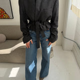 Belted blazer in speckered black wool