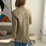 Double-breasted speckered beige button back blazer