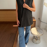 Double-breasted button back vest in green houndstooth