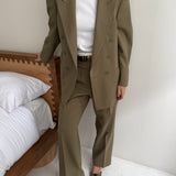 Pale green double breasted suit