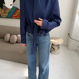Blue checkered belted blazer